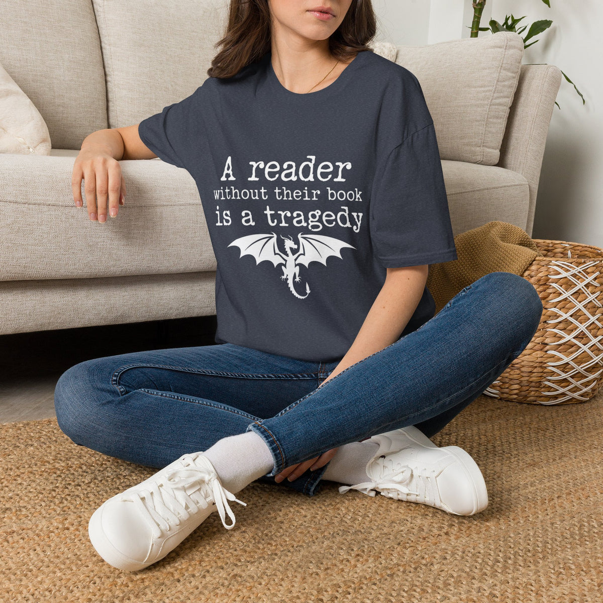 A reader without their book is a tragedy T-Shirt