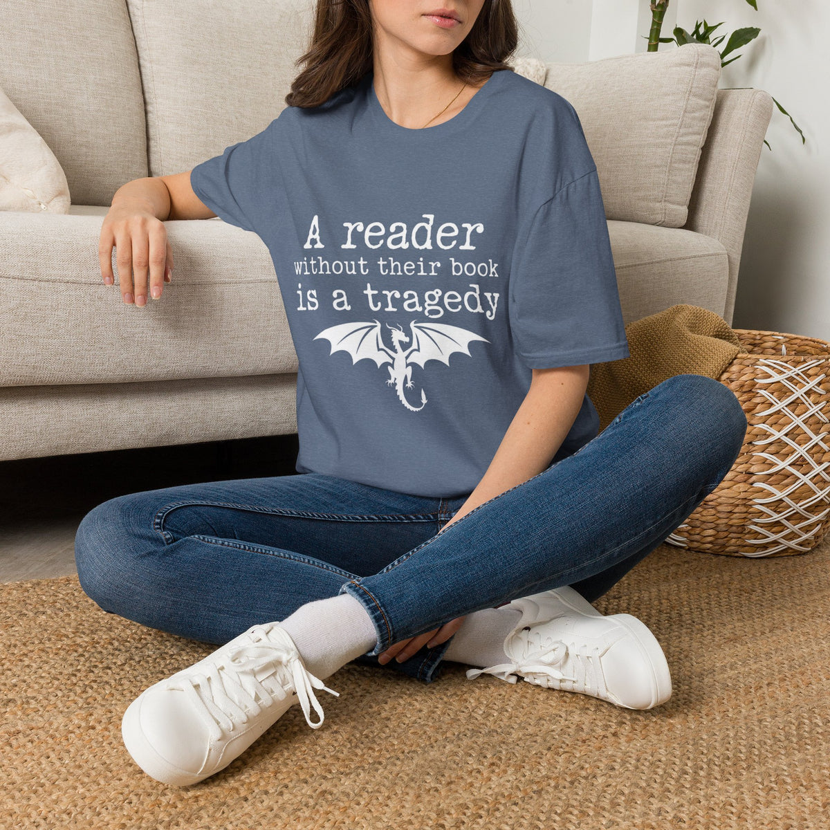 A reader without their book is a tragedy T-Shirt